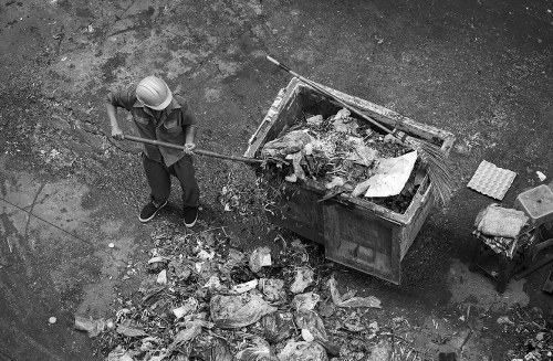 Business professionals managing waste in Finchley office
